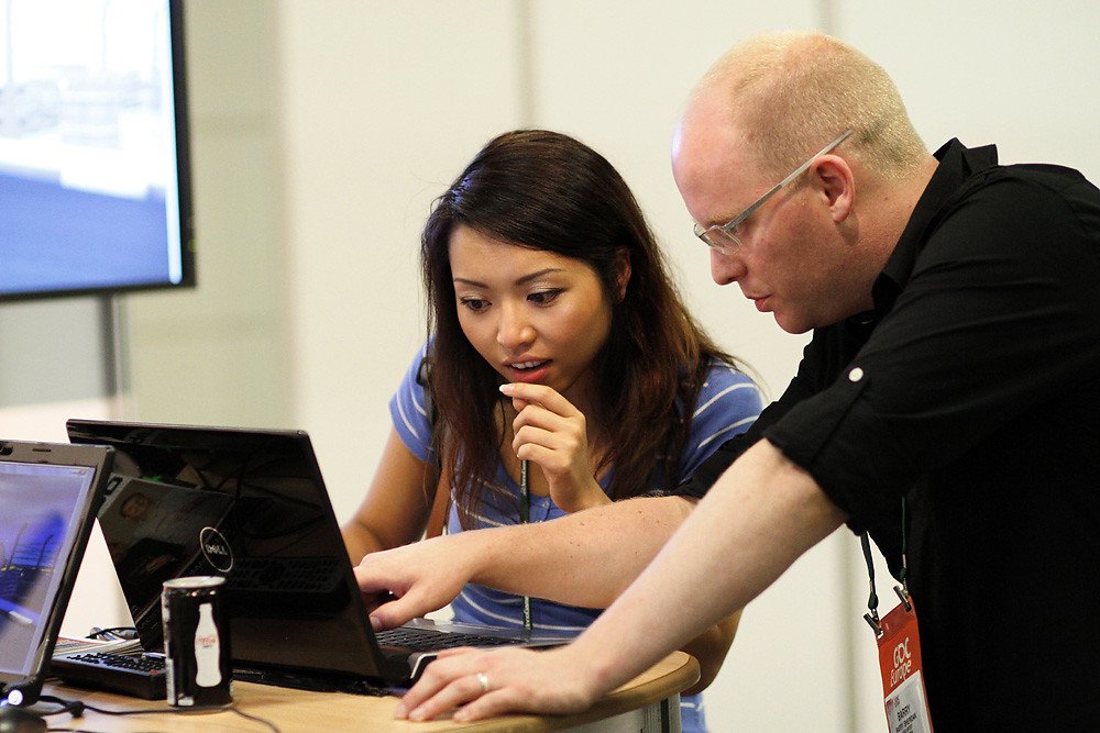 Hands-on executive training session with a laptop